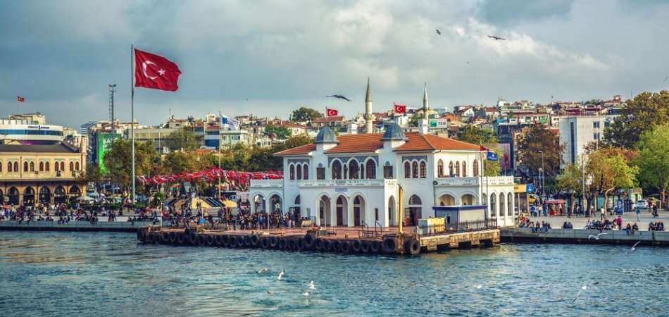 View of a charming residential neighborhood in Kadikoy like Moda, with typical buildings and greenery.