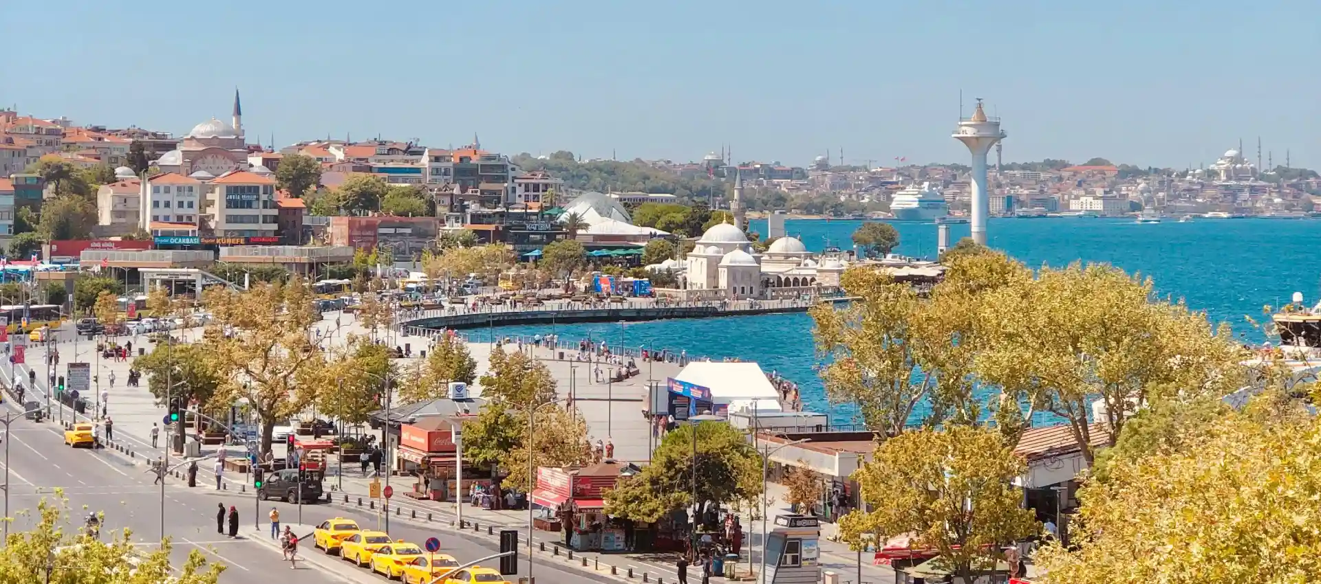 Panoramic view of the Bosphorus showing both the modern Kadikoy district and the historic Uskudar district on the Asian side.